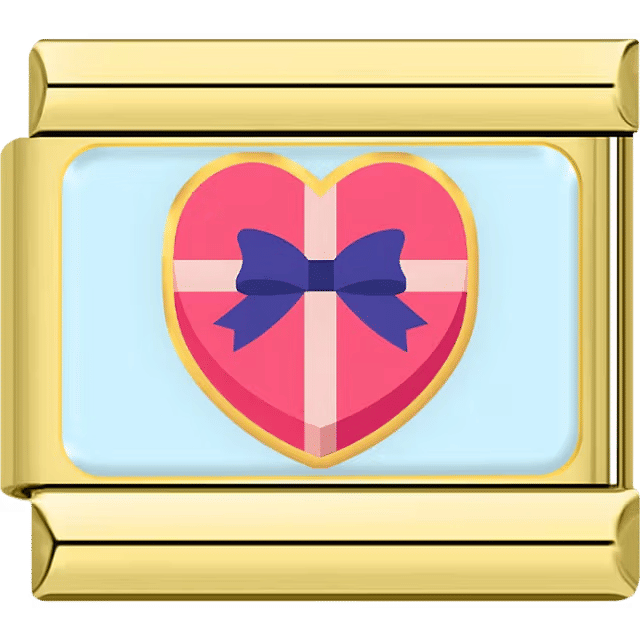 Heart-shaped gift box with a purple bow on a gold Italian charm
